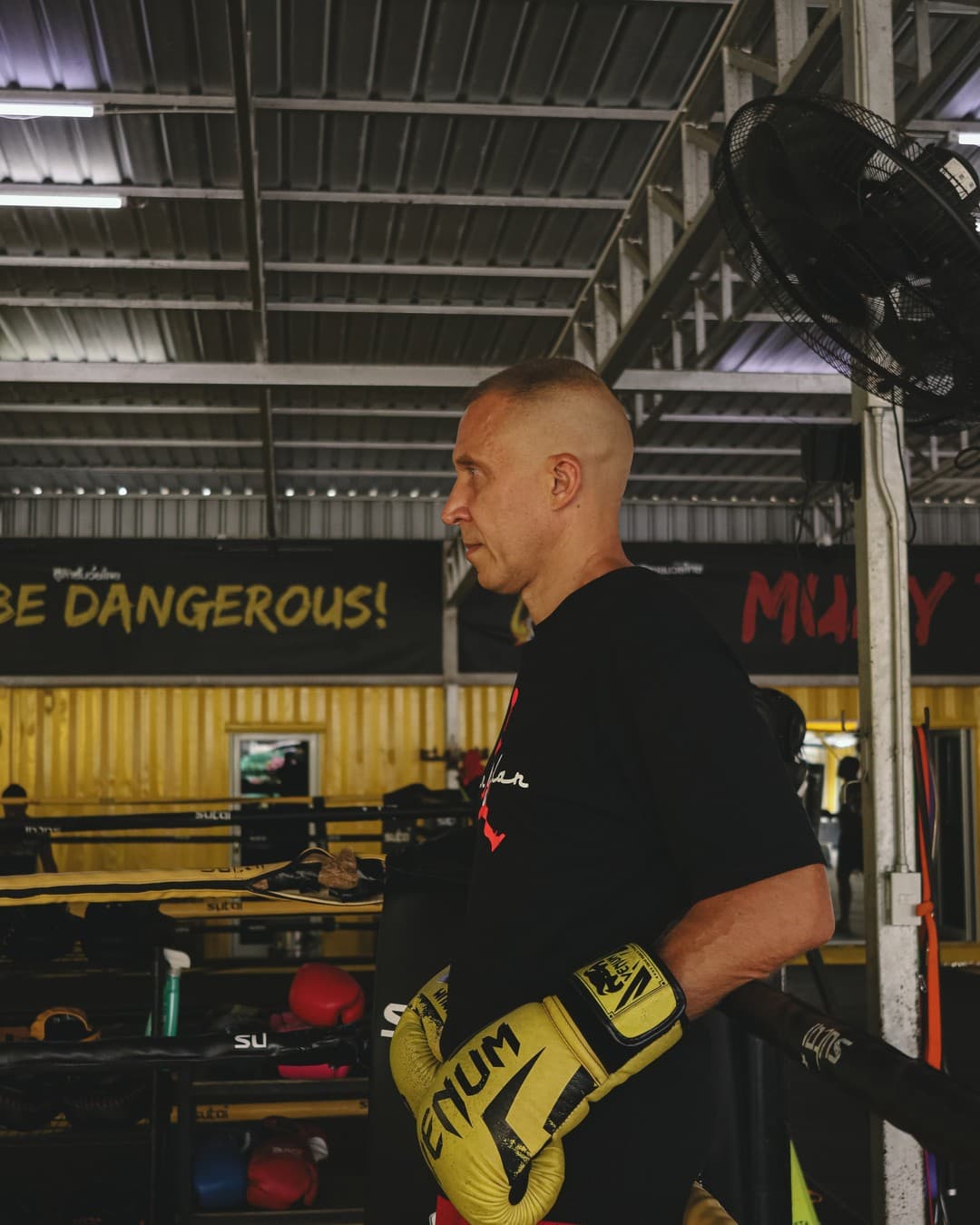 Coach demonstrating boxing stance